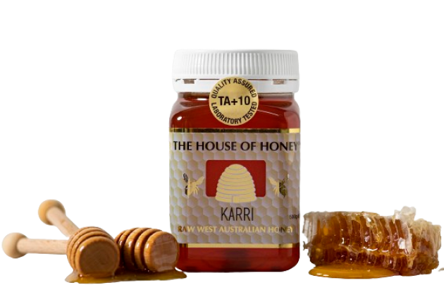 Jar of honey from 'The House of Honey' with honeycombs on a white background